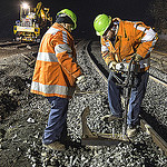 Workers repair track after 2013 Metro North derailment near the Spuyten-Duyvil station in the Bronx.
